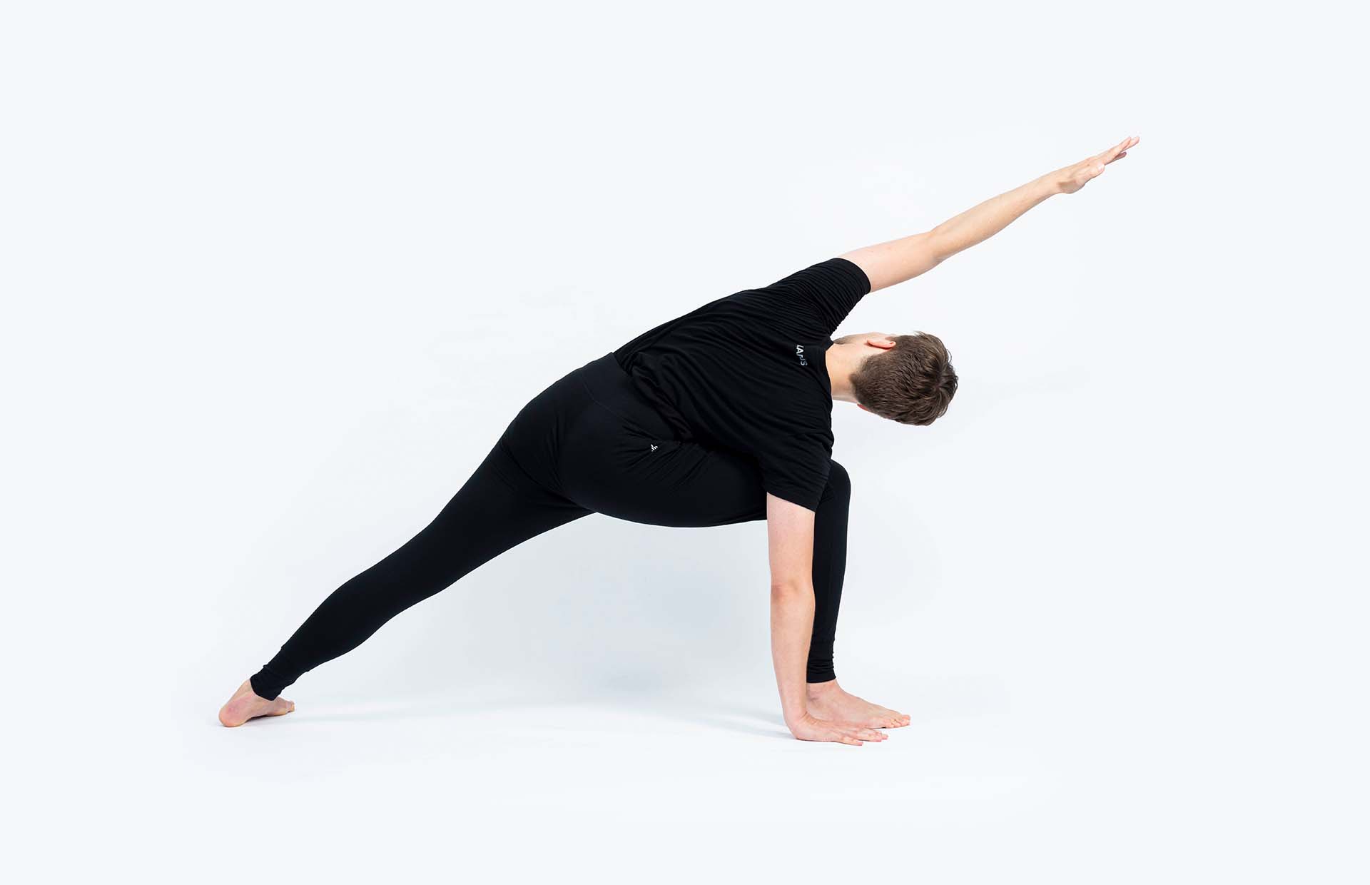 A person bending in Utthita Parsvakonasana A (Extended Side Angle A)