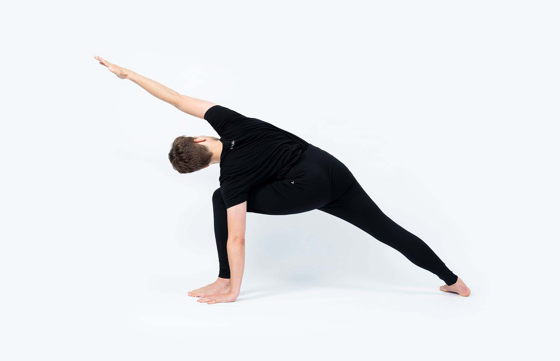 A person in Utthita Parsvakonasana A (Extended Side Angle A)